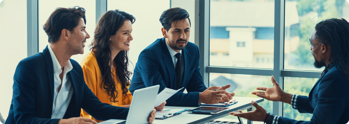 Team members from HR, Sales, and Projects working together using shared digital tools for better coordination.